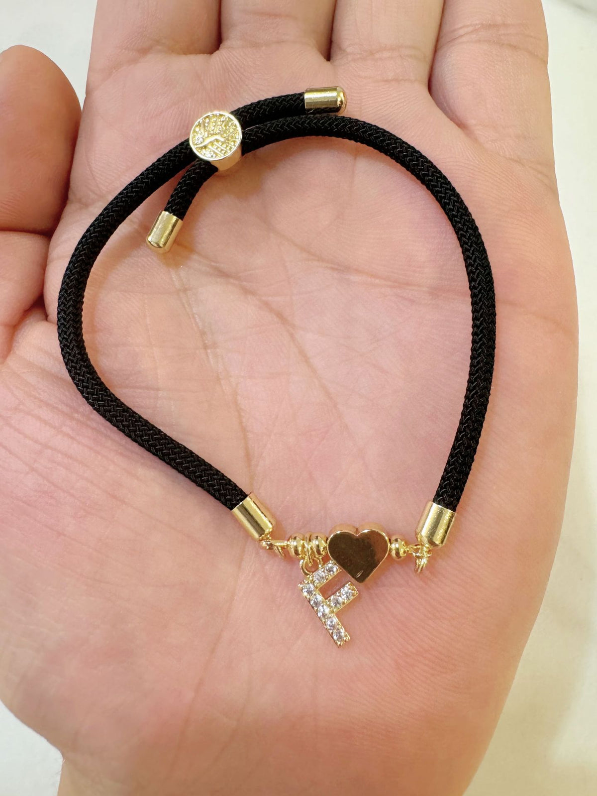 Black initial rope bracelet, letter F