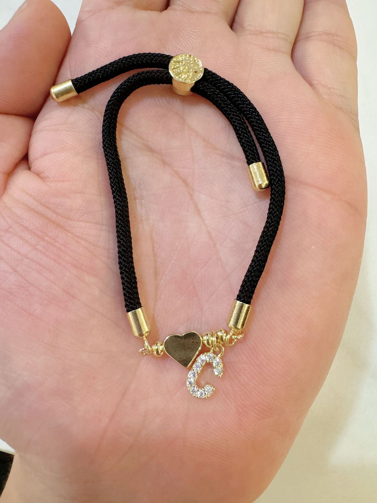 Black initial rope bracelet, letter C