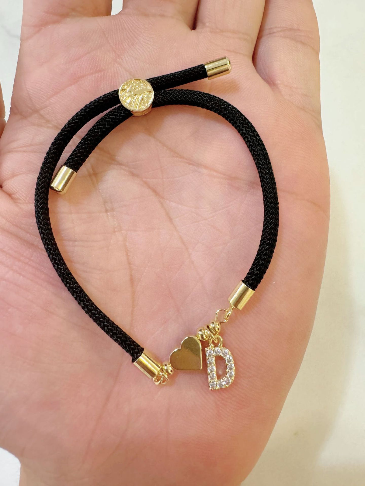 Black initial rope bracelet, letter D