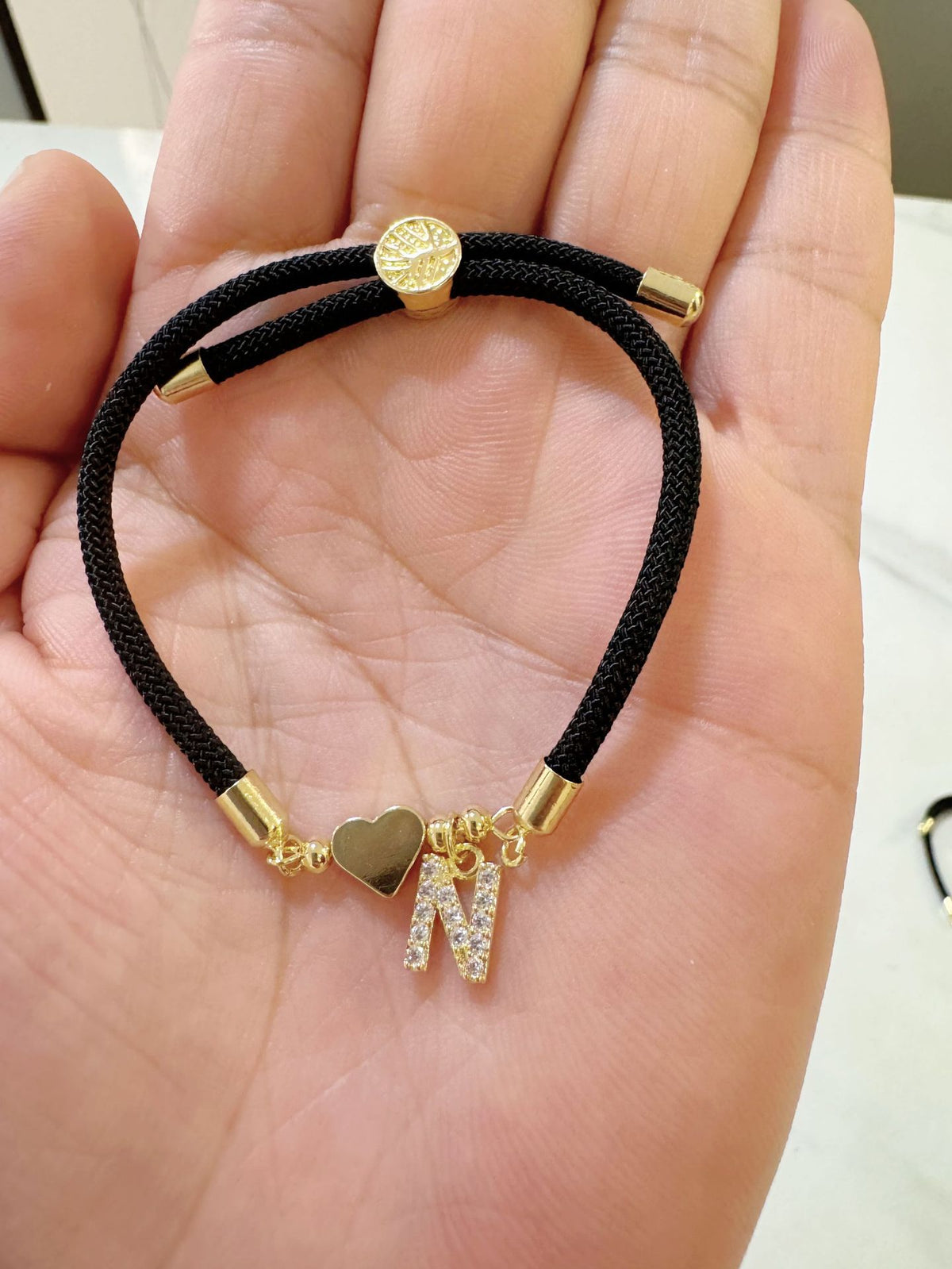 Black initial rope bracelet, letter N