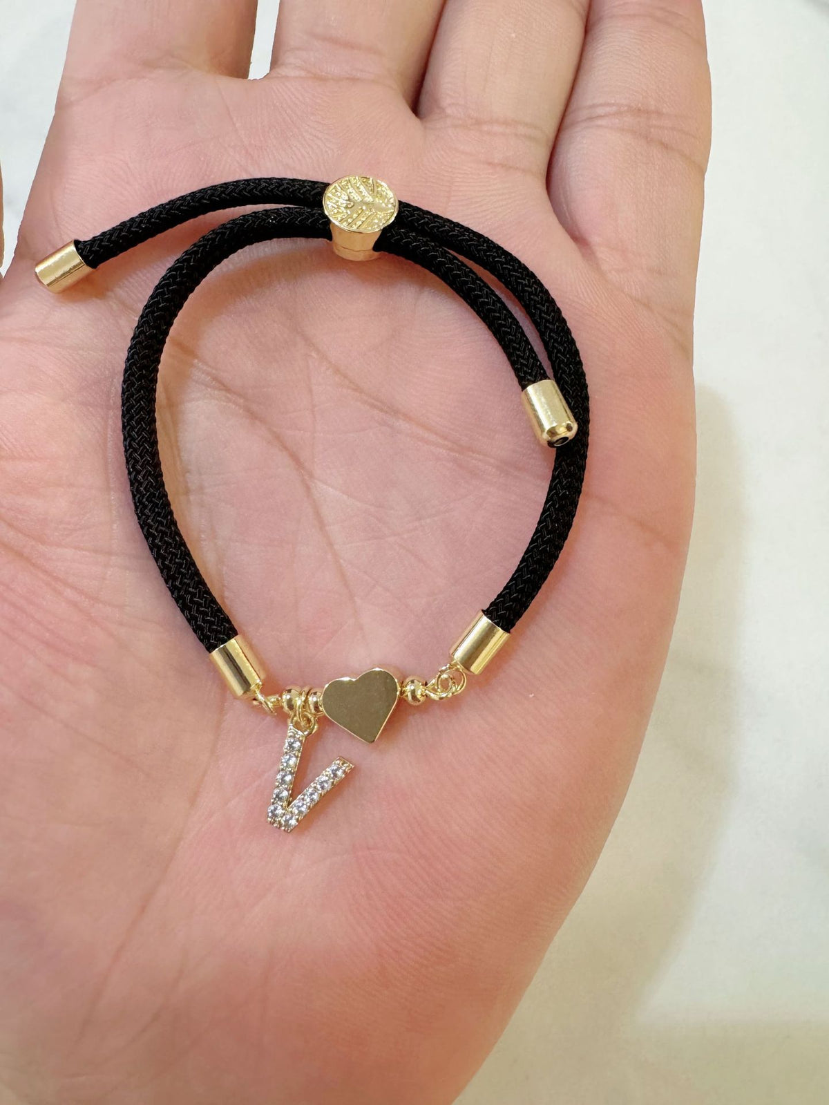 Black initial rope bracelet, letter V