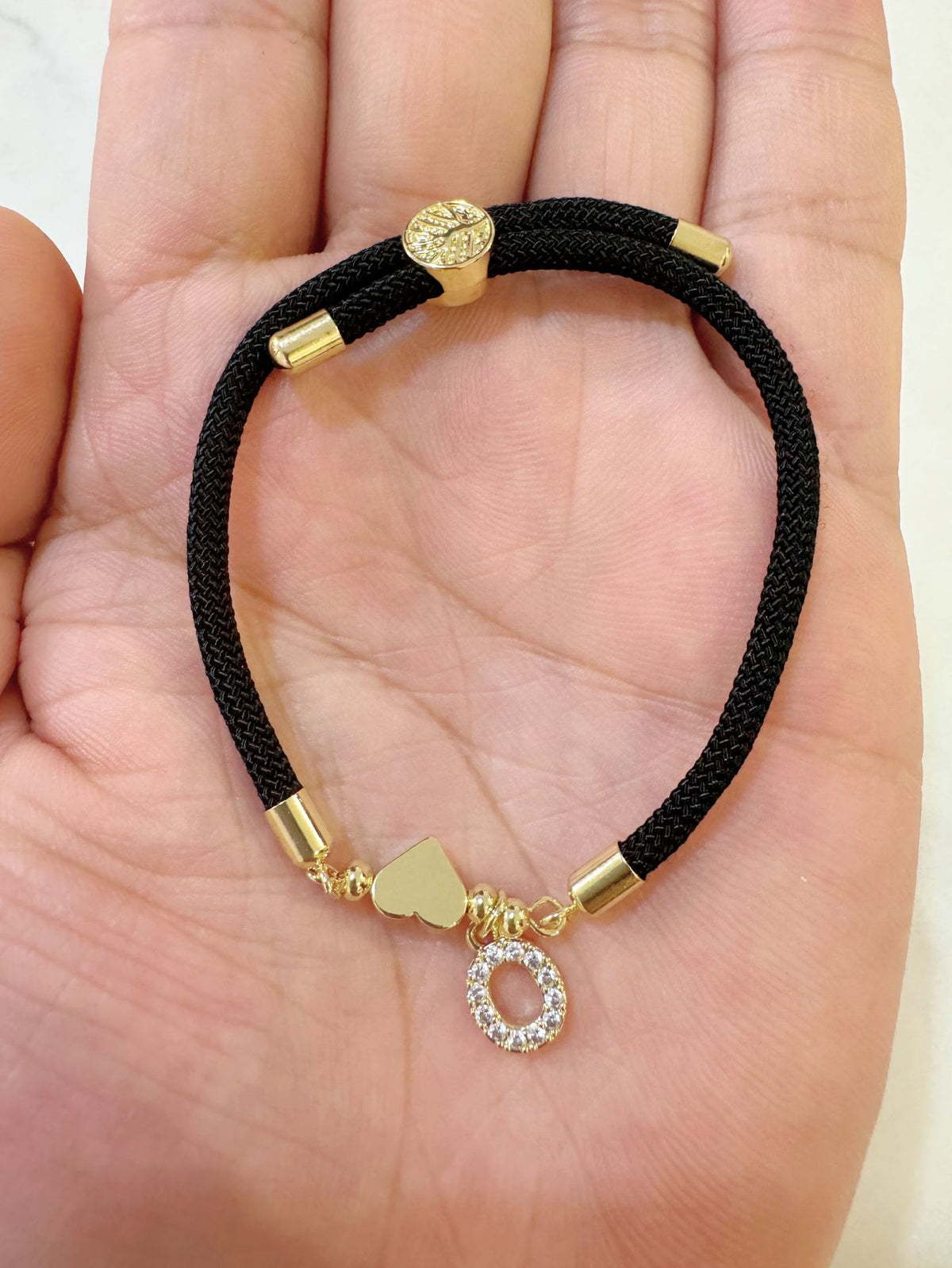 Black initial rope bracelet, letter O