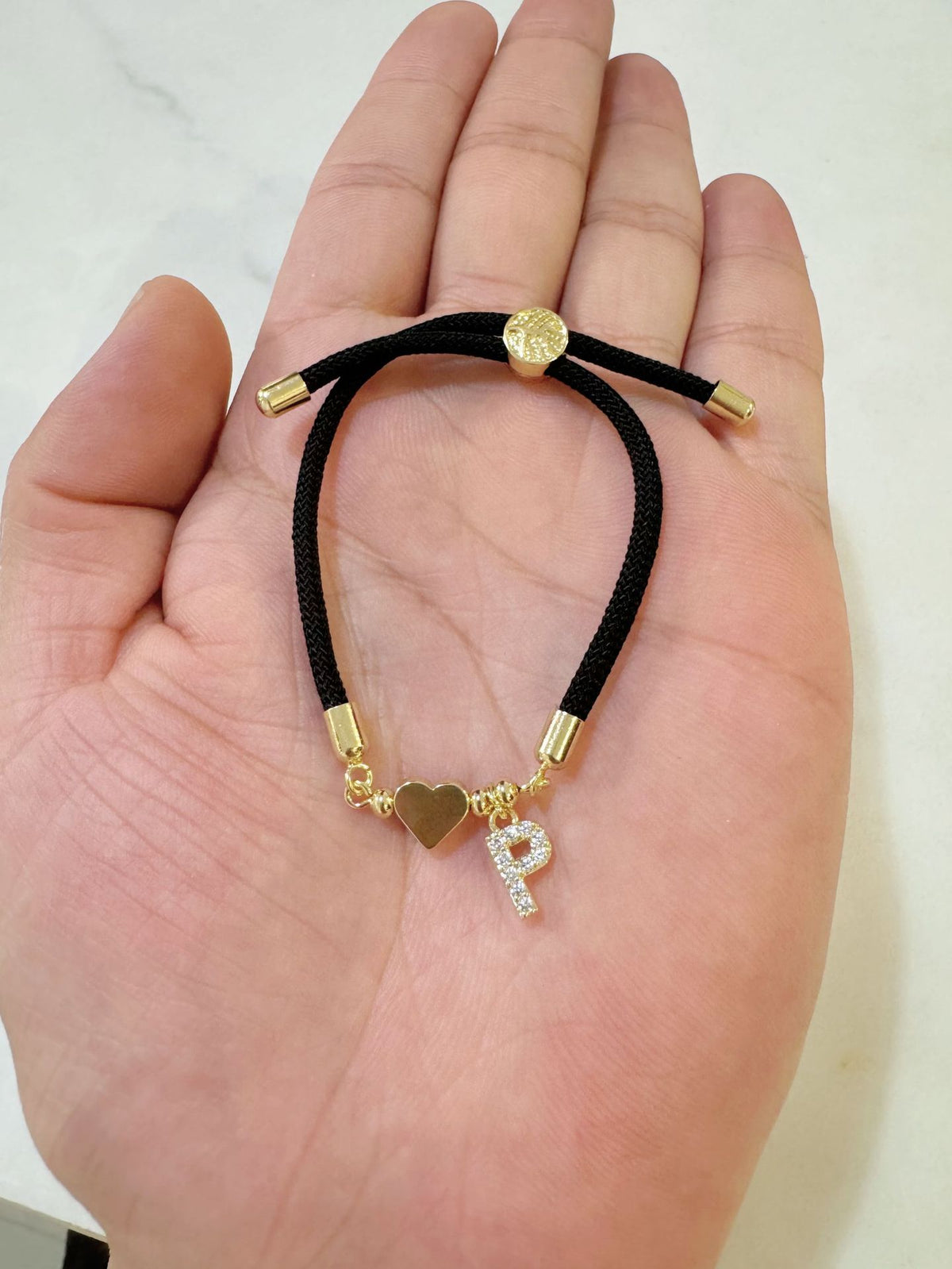 Black initial rope bracelet, letter P