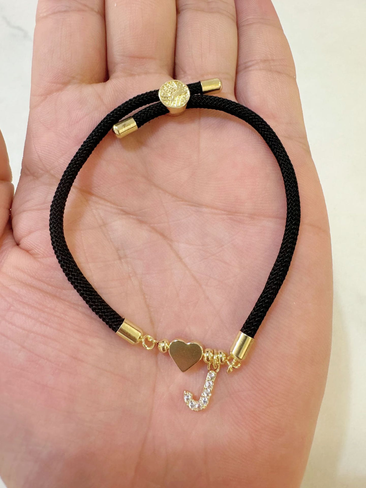 Black initial rope bracelet, letter J
