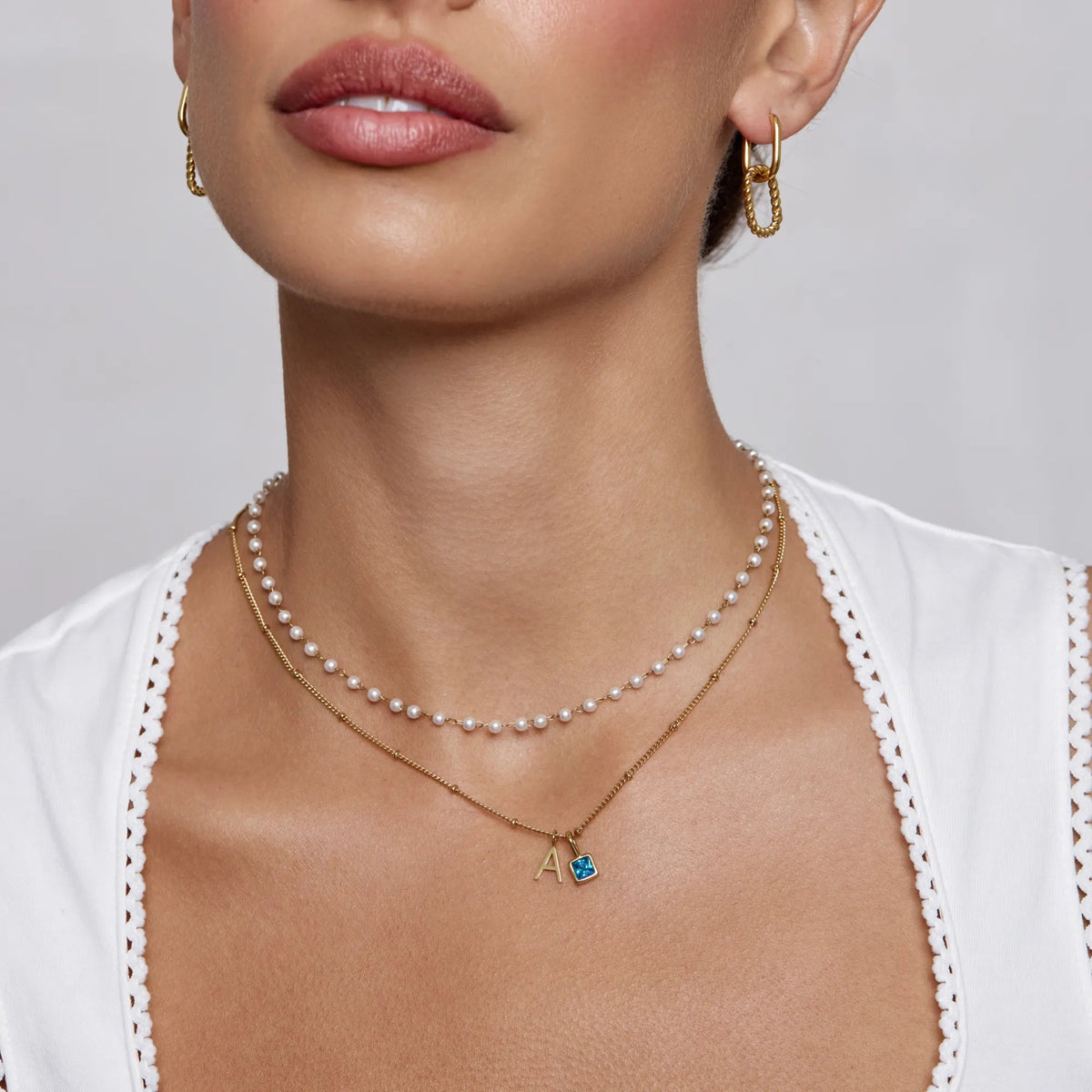 Letter birthstone necklace worn