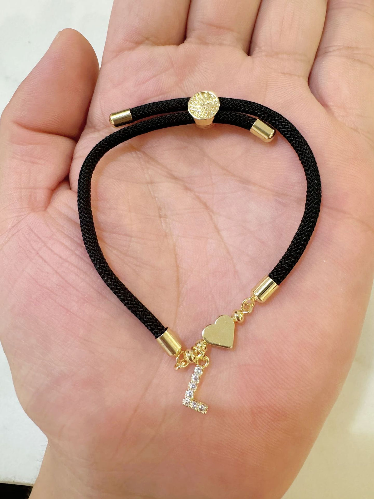 Black initial rope bracelet, letter L
