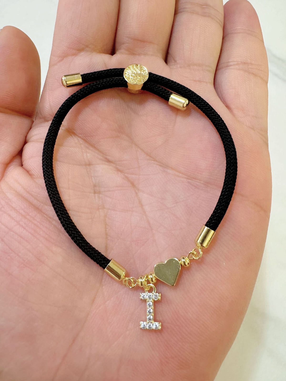 Black initial rope bracelet, letter I