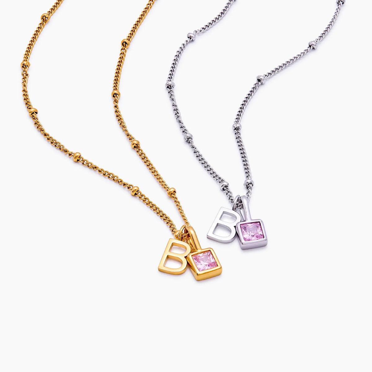 Letter birthstone necklaces in gold and silver