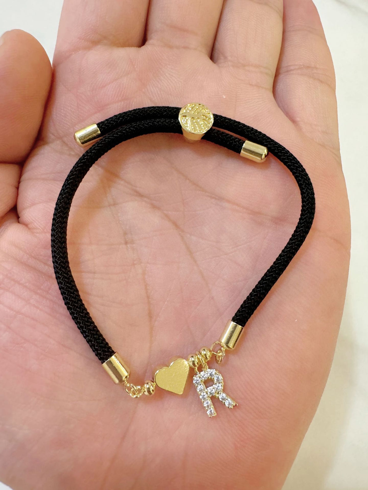 Black initial rope bracelet, letter R