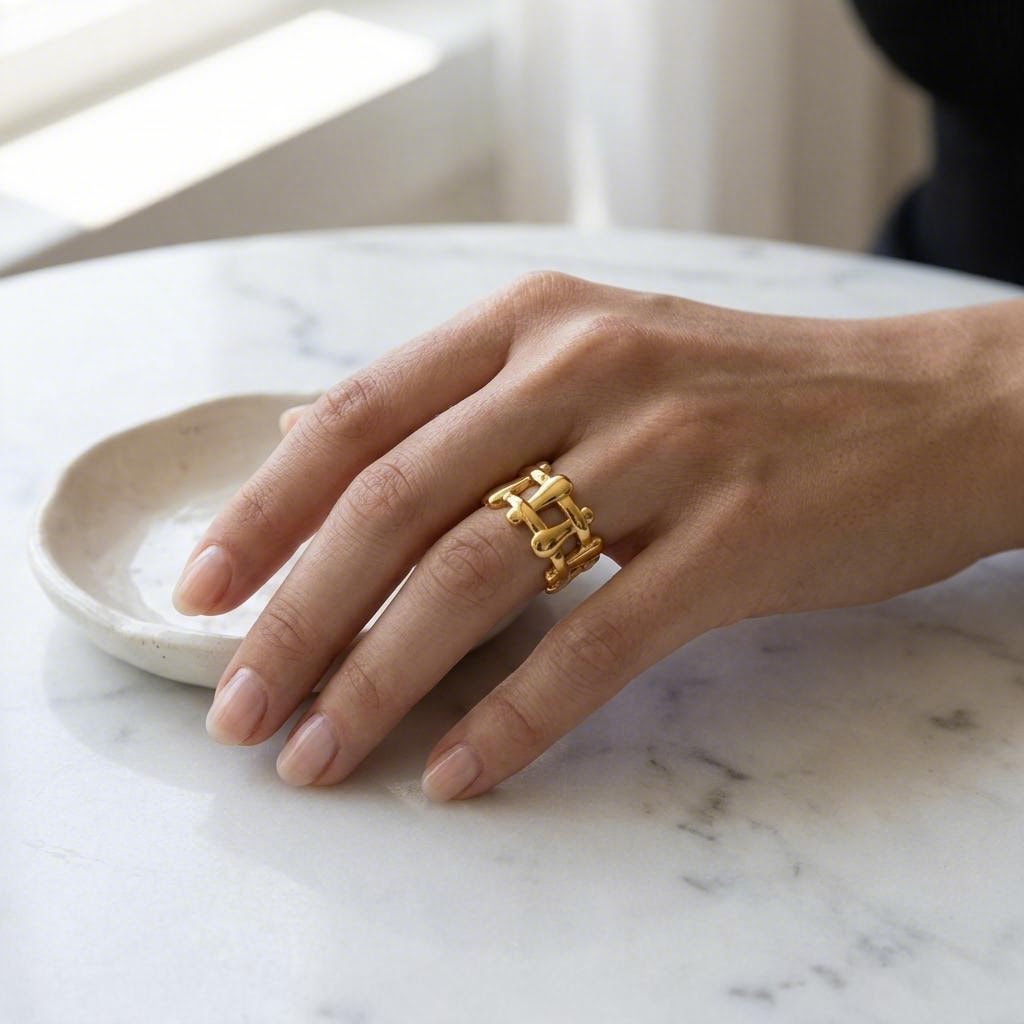 Bold Link Ring worn on the hand