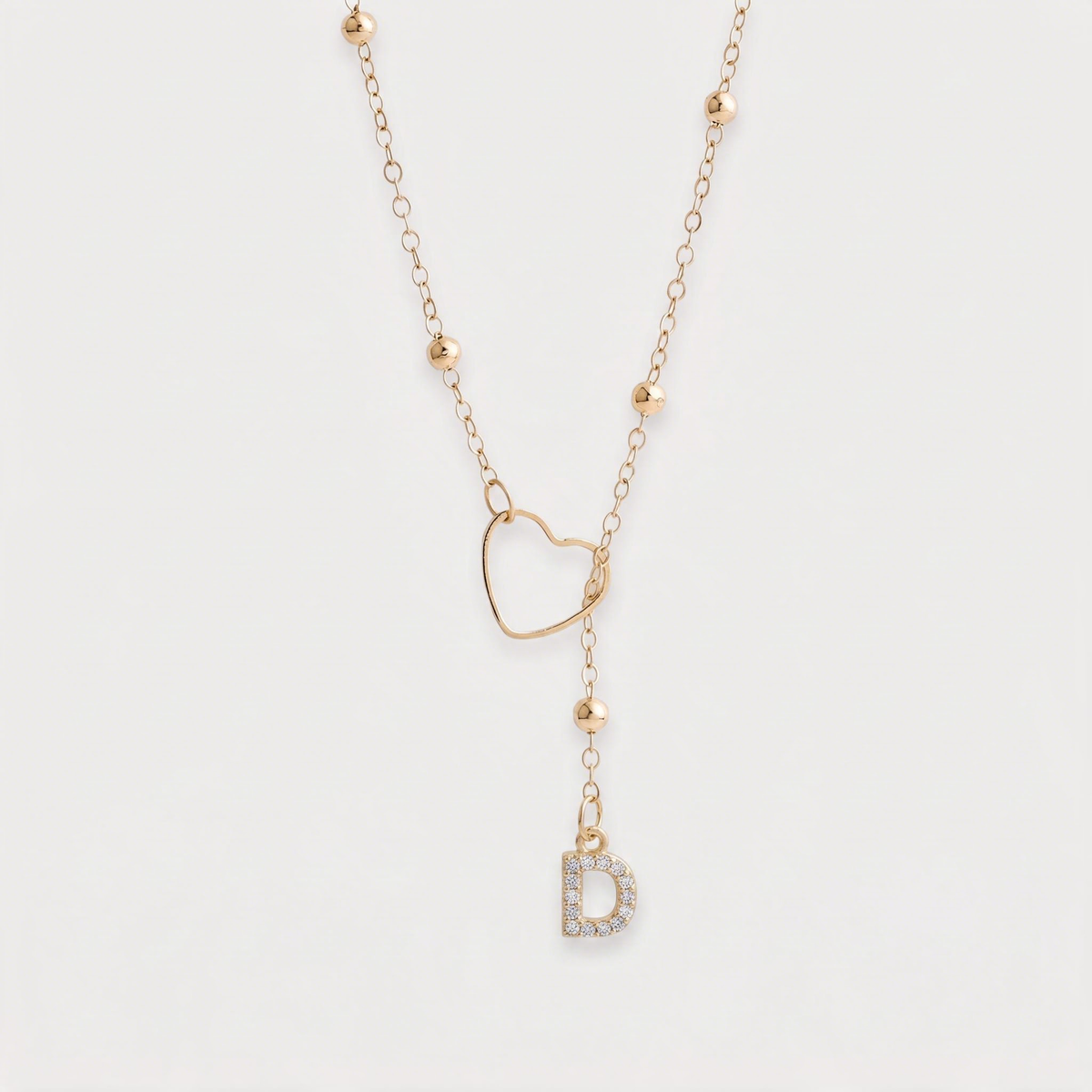Letter D · gold