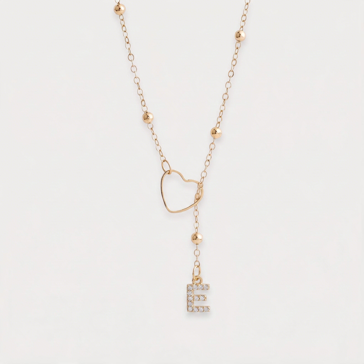 Letter E · gold