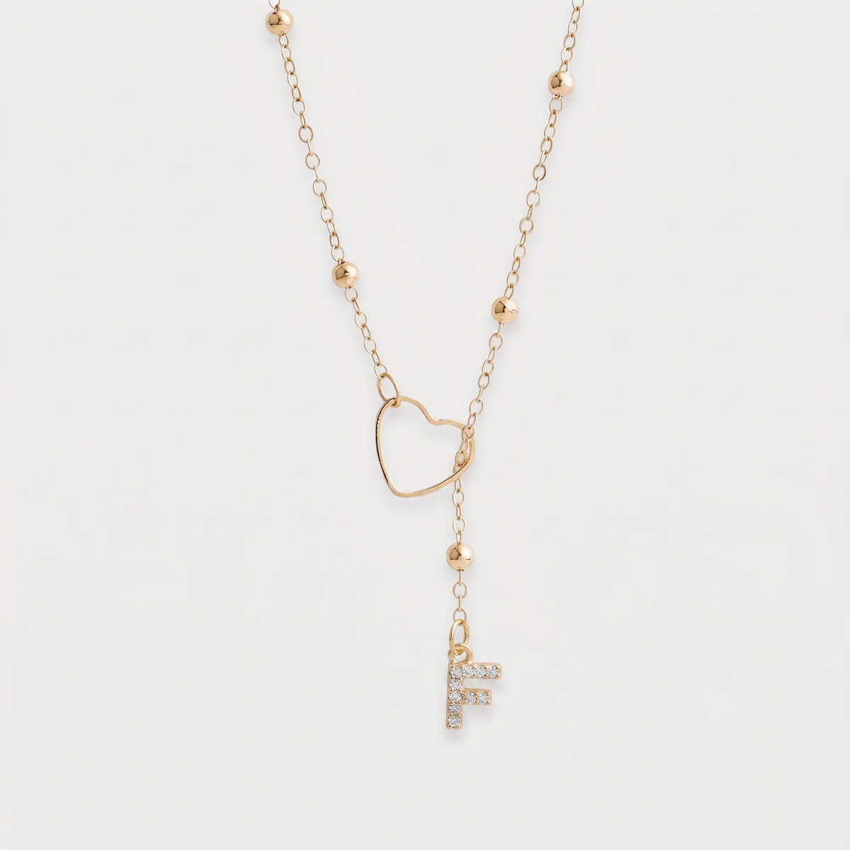 Letter F · gold