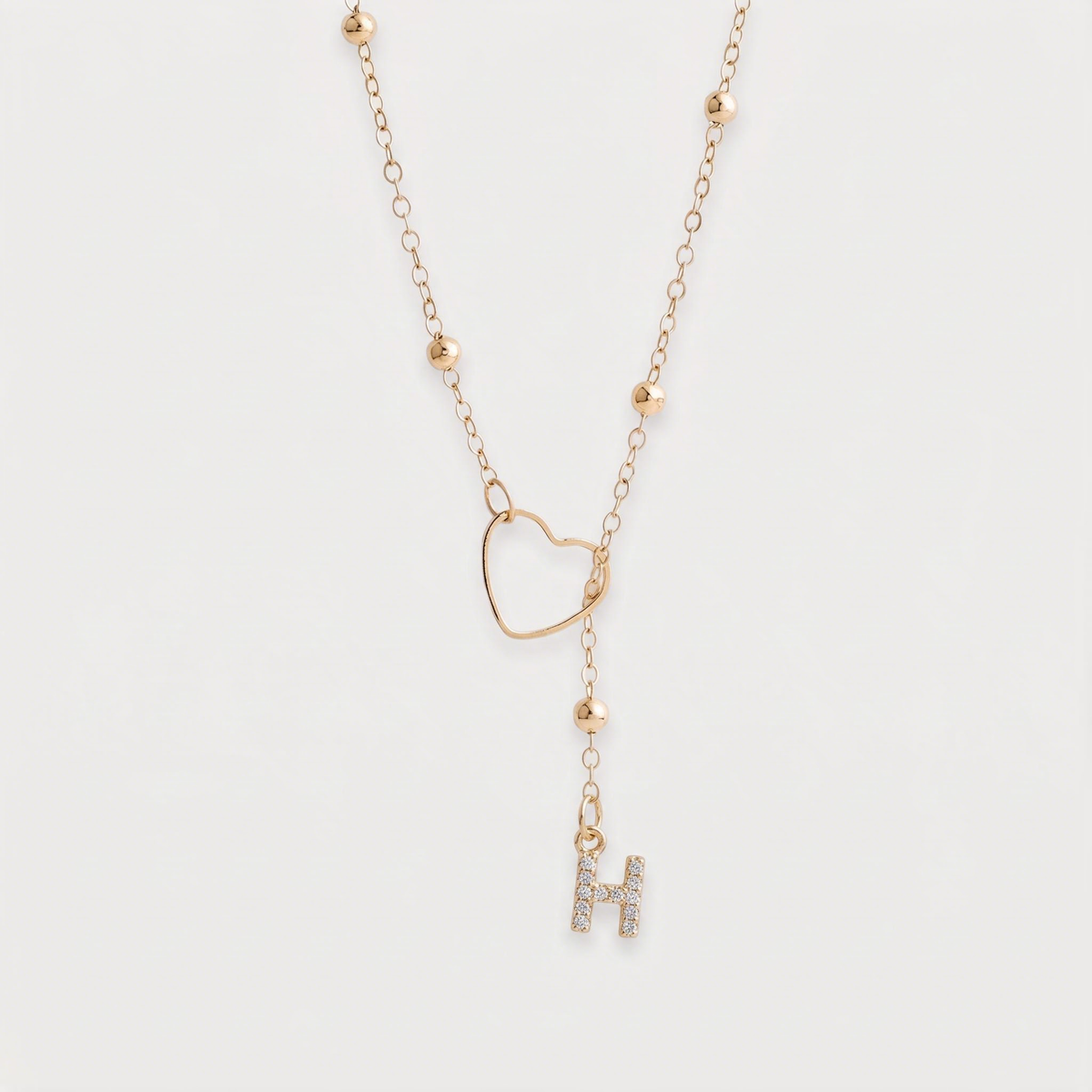 Letter H · gold