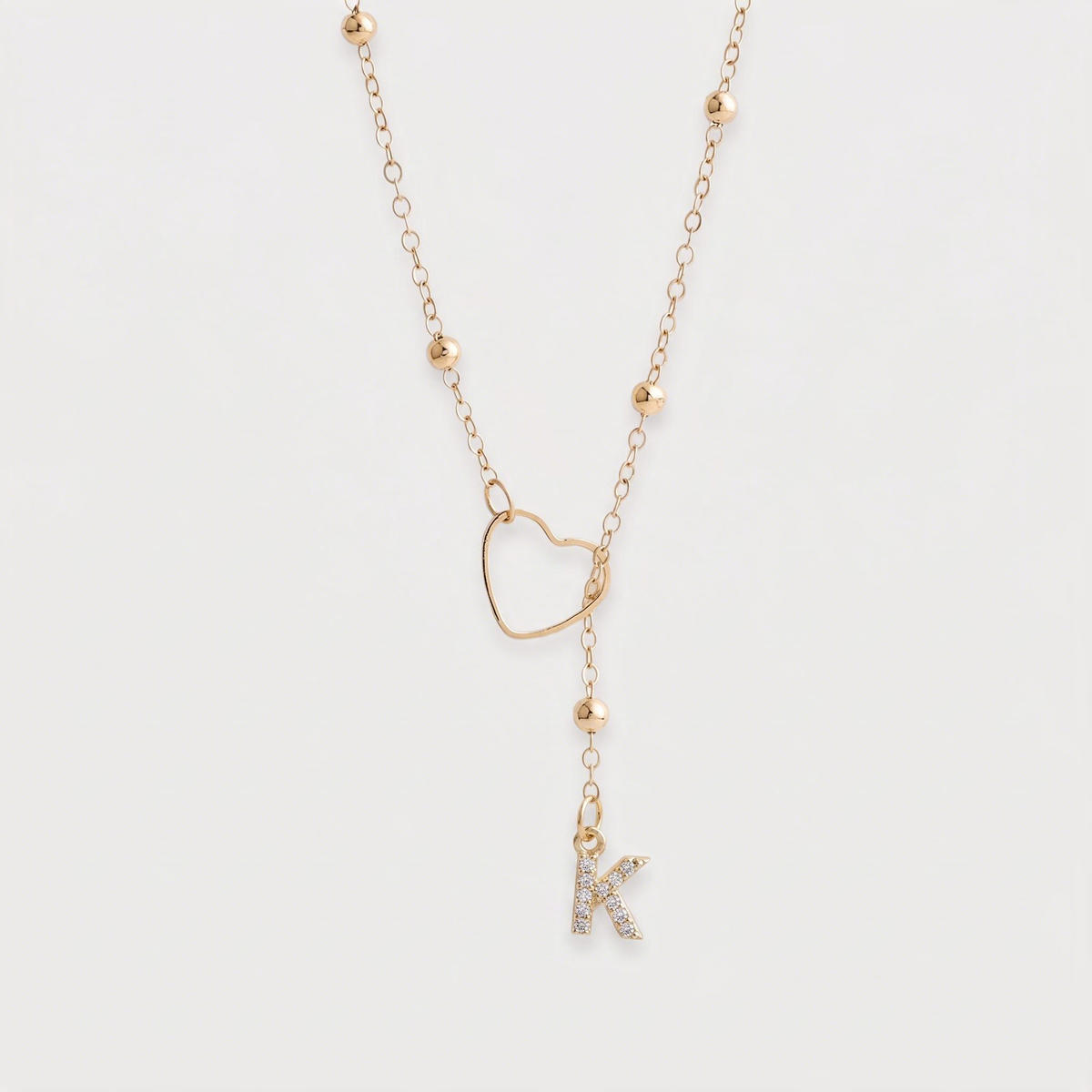 Letter K · gold