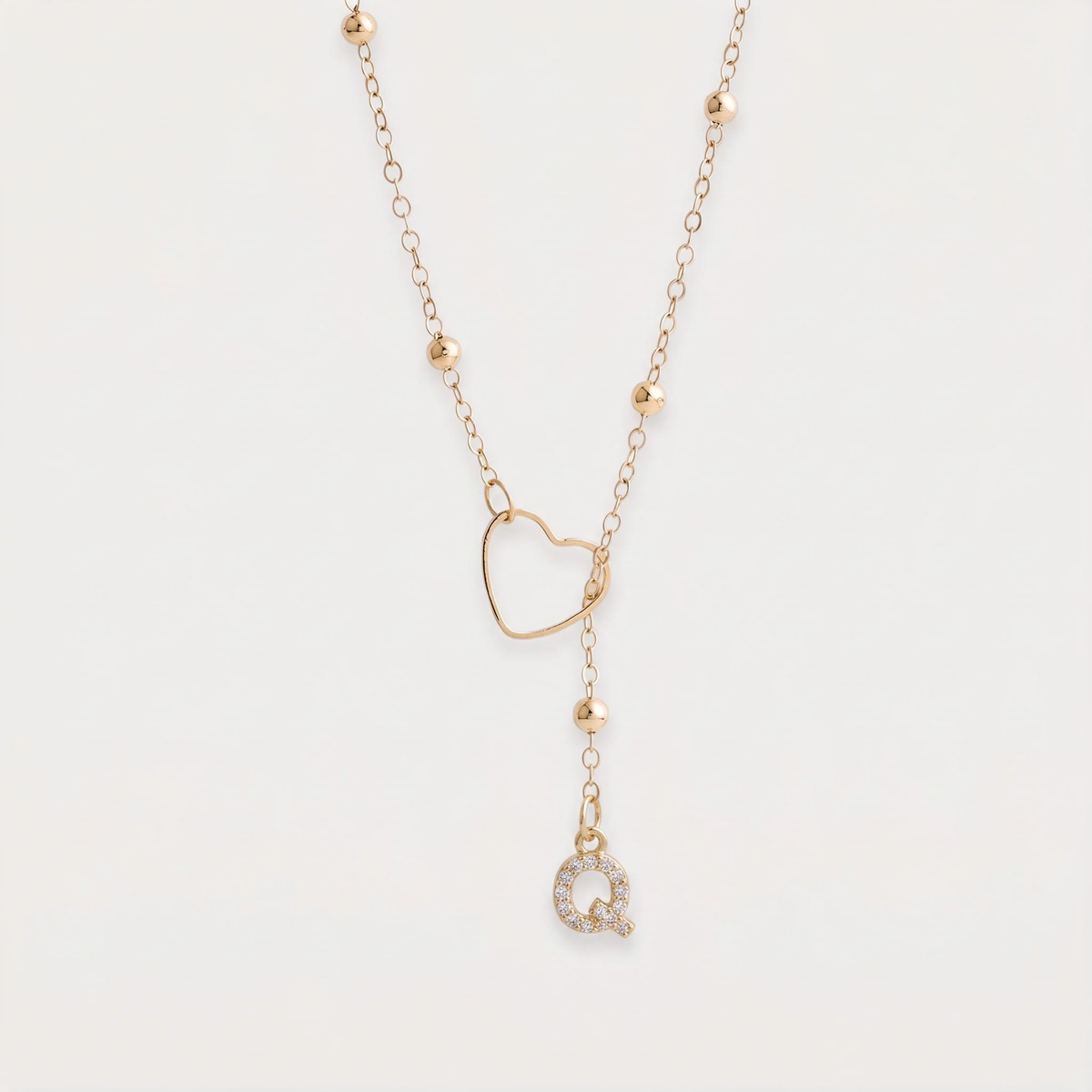 Letter Q · gold