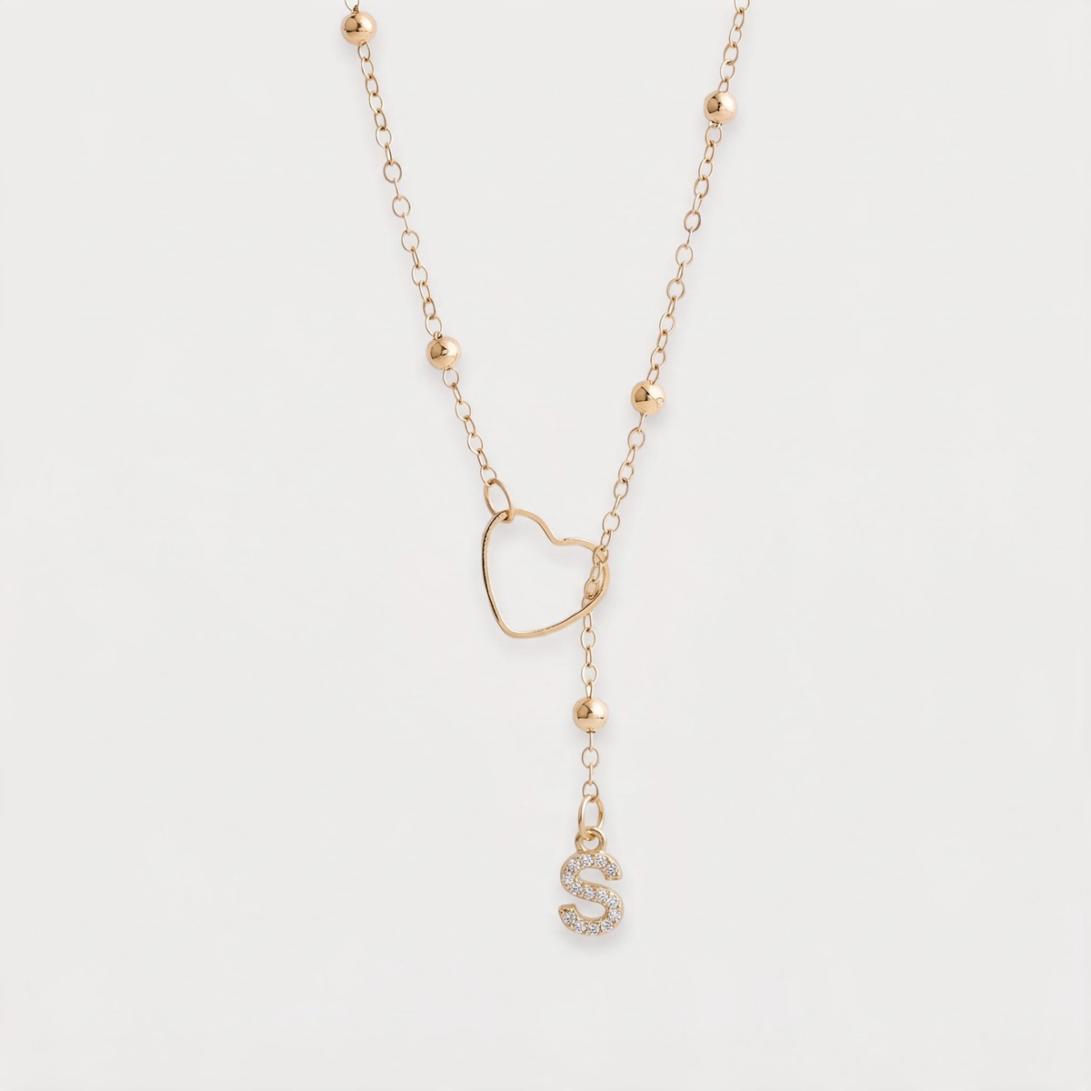 Letter S · gold