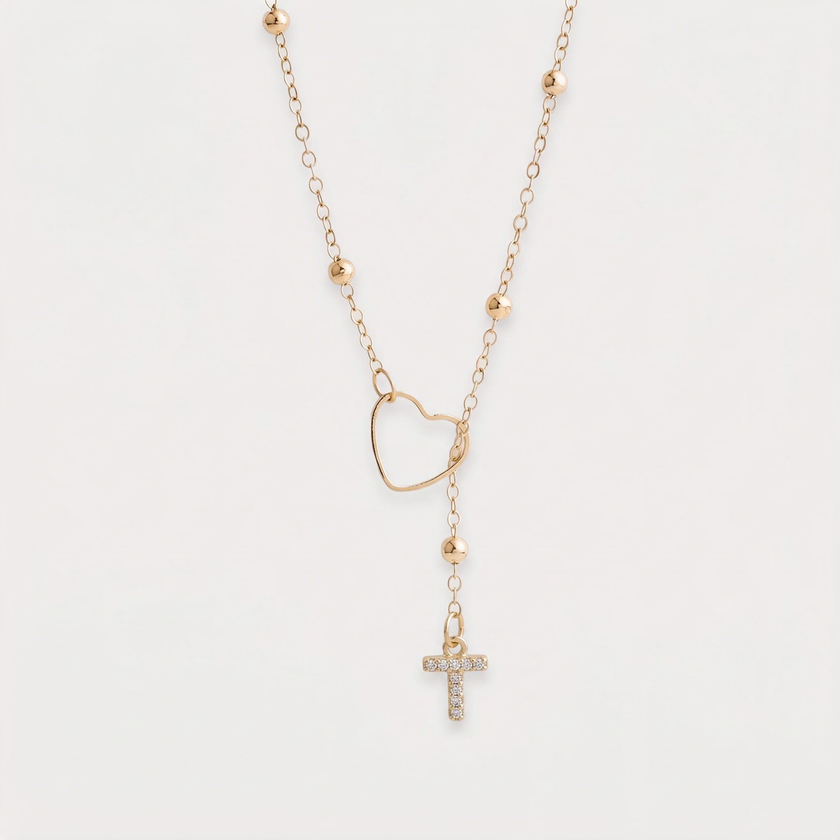 Letter T · gold