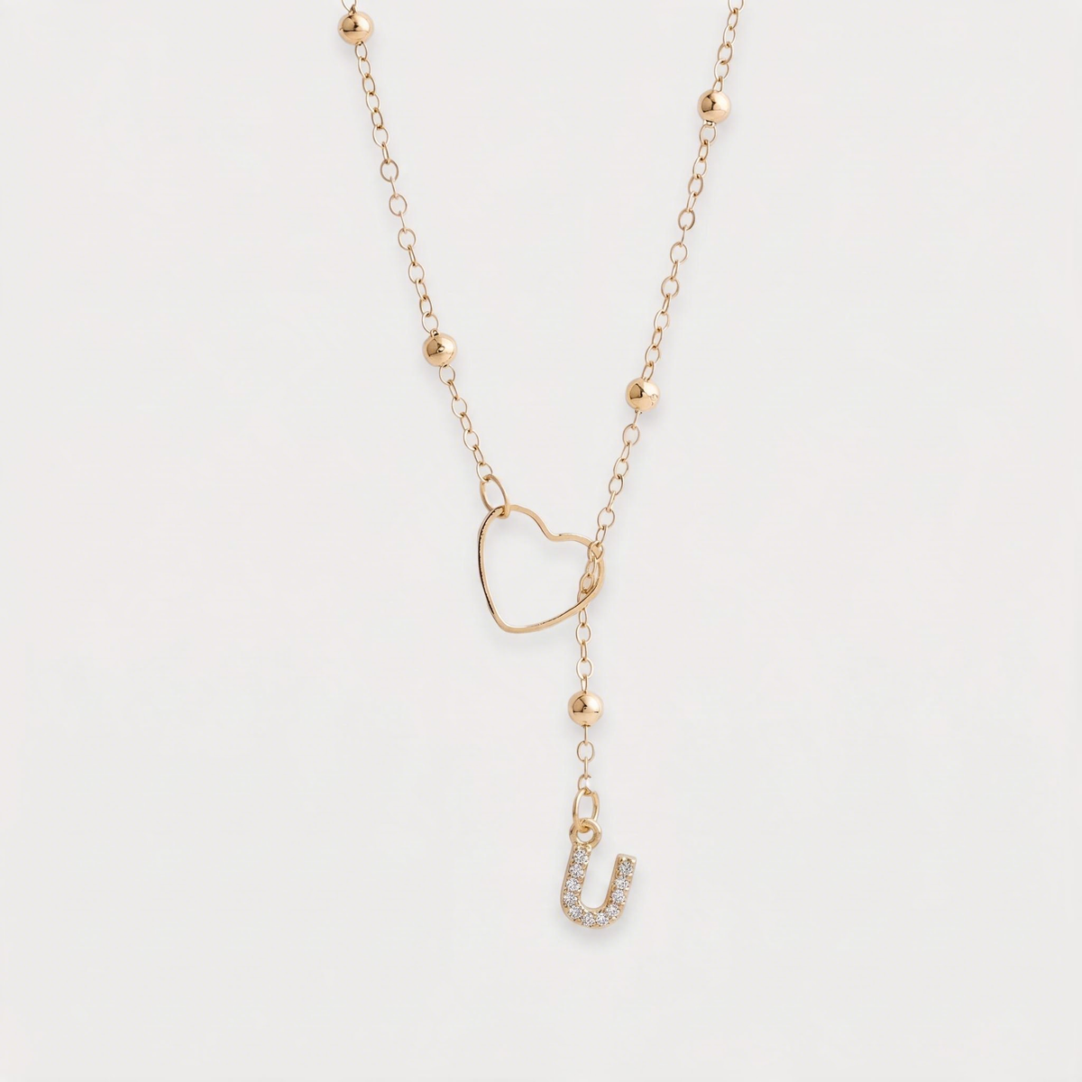 Letter U · gold