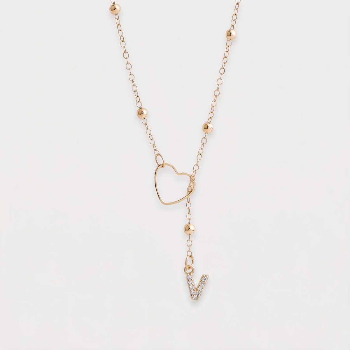 Letter V · gold