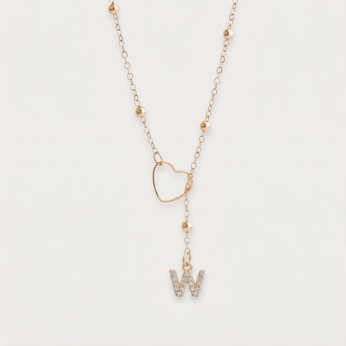 Letter W · gold