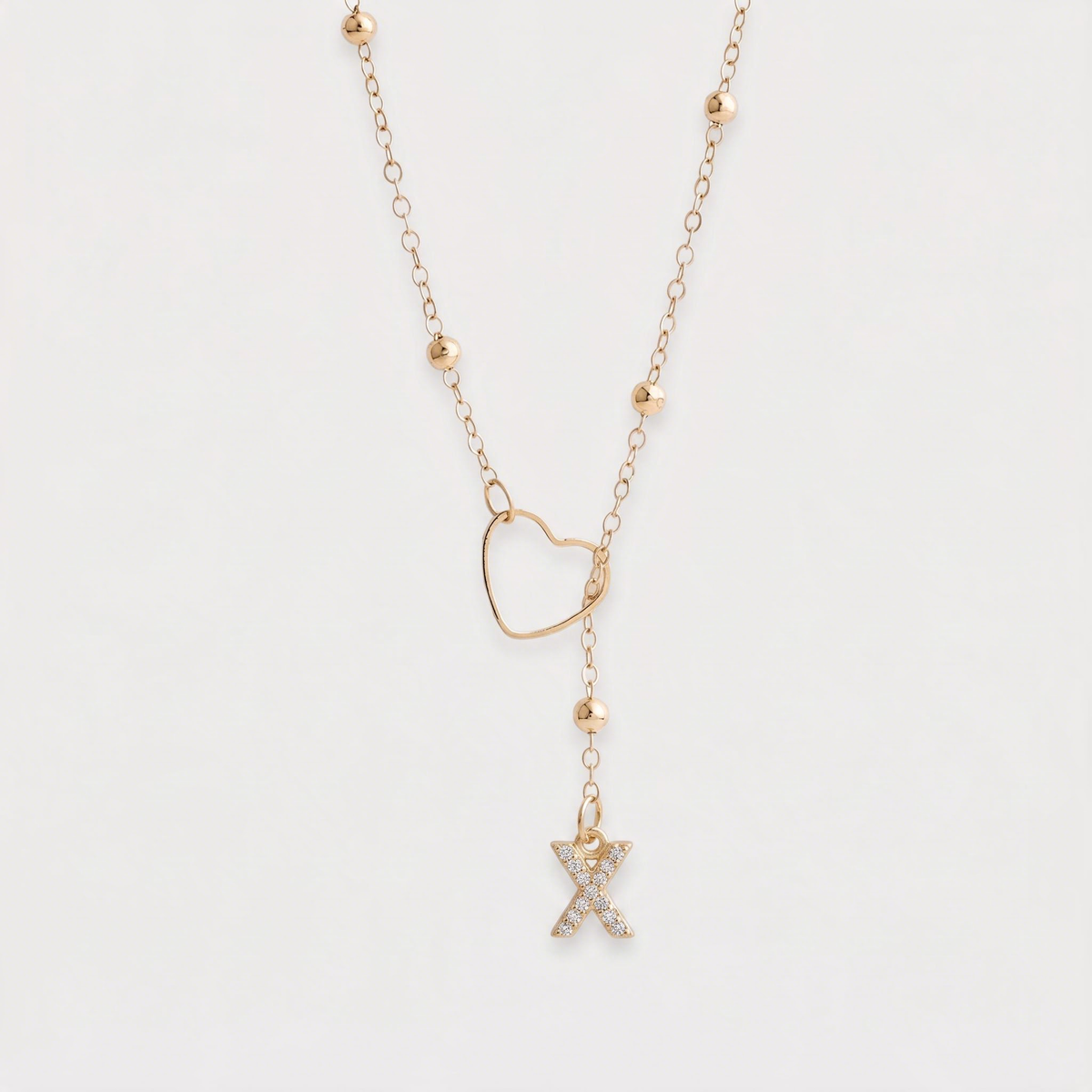 Letter X · gold