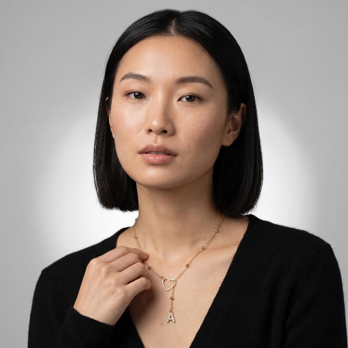 Drop Initial Necklace worn by a model