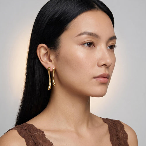 Amur Punk Earrings worn by a model