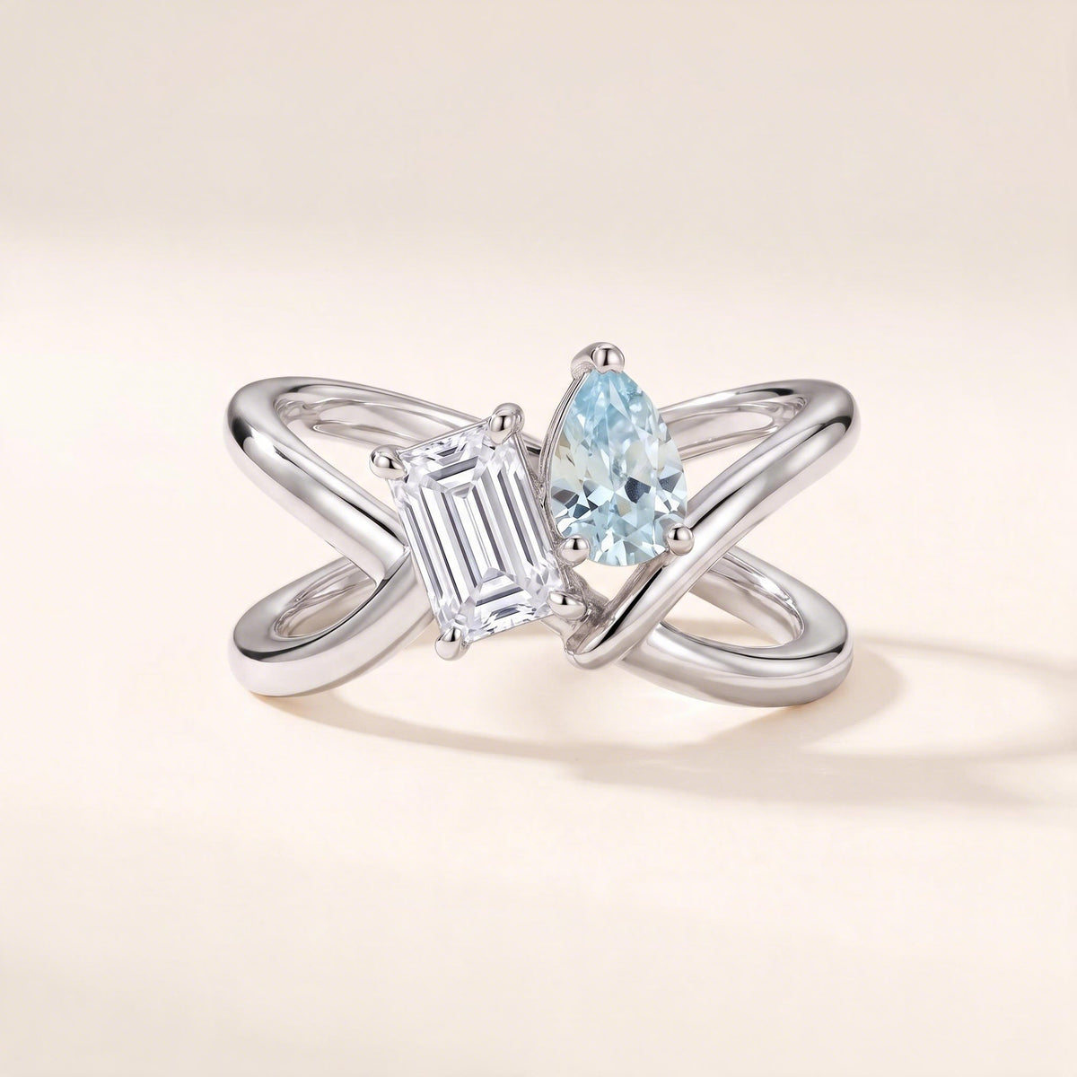 Friendship Infinity Ring in silver with an aquamarine pear stone