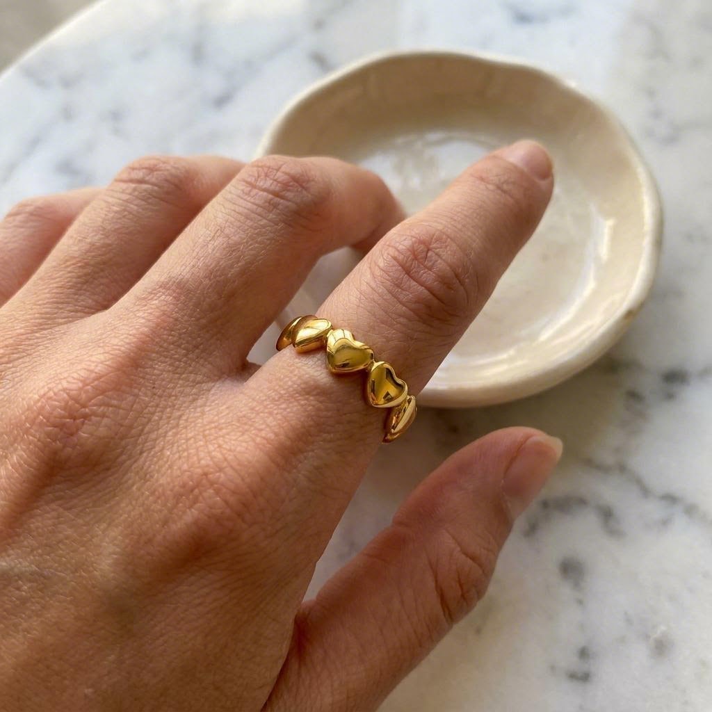 Heart Chain Ring worn on the hand