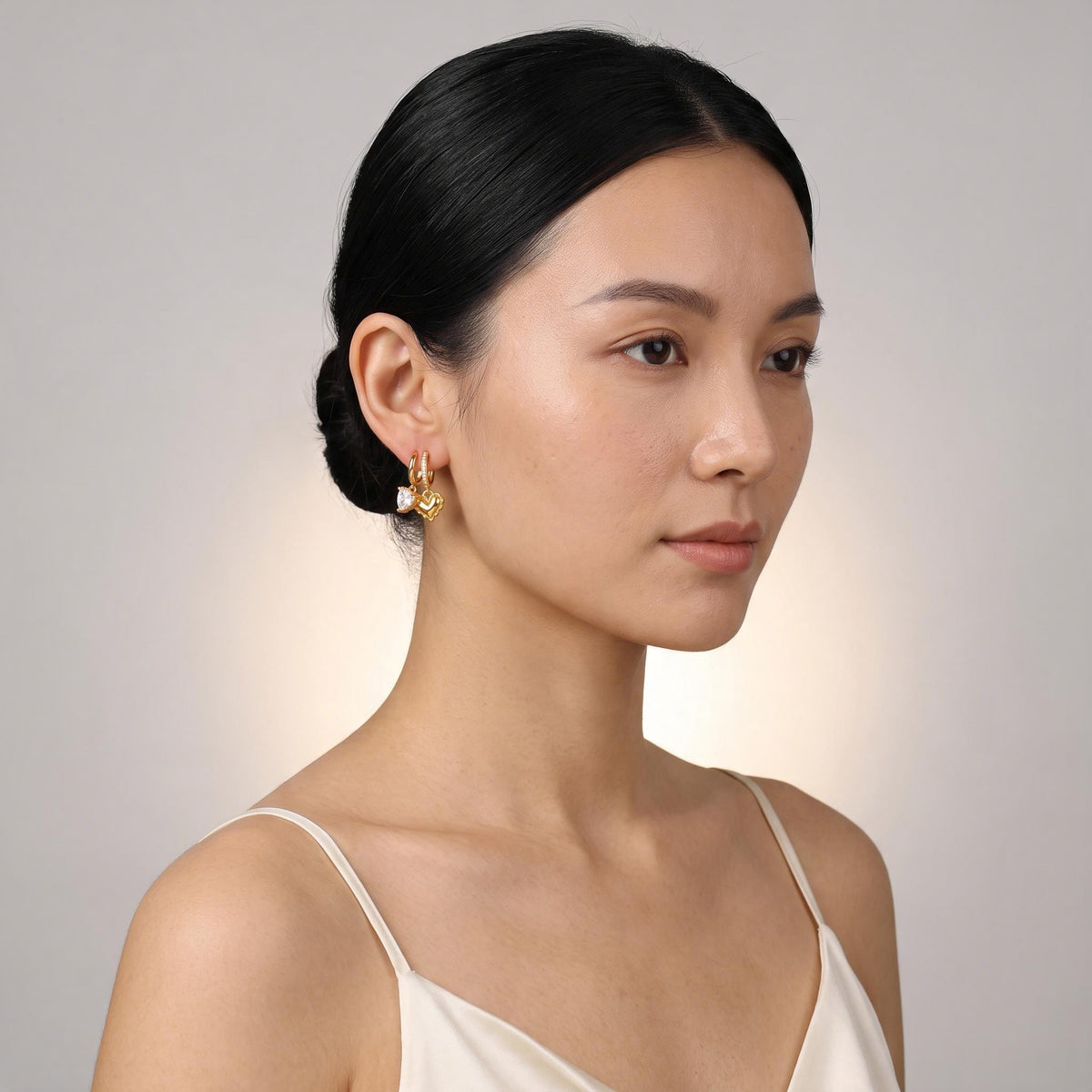 Heart Love Earrings worn by a model