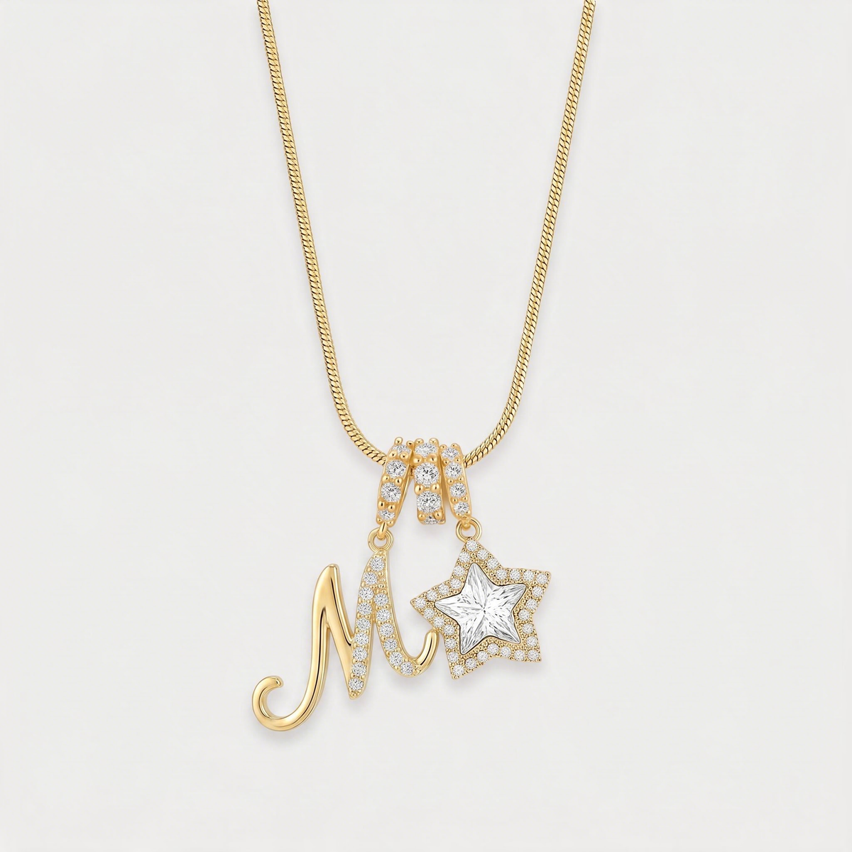Letter M · gold