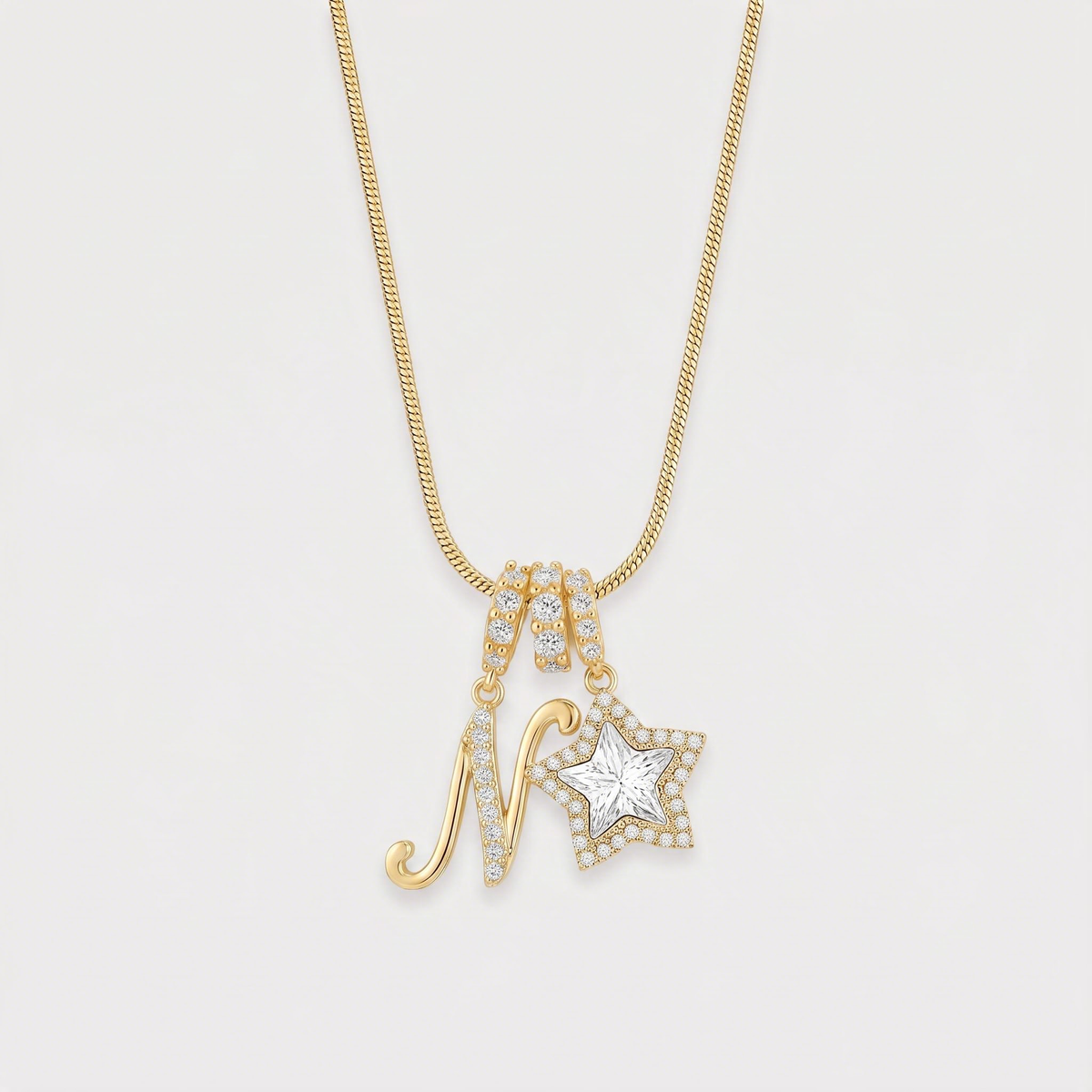 Letter N · gold