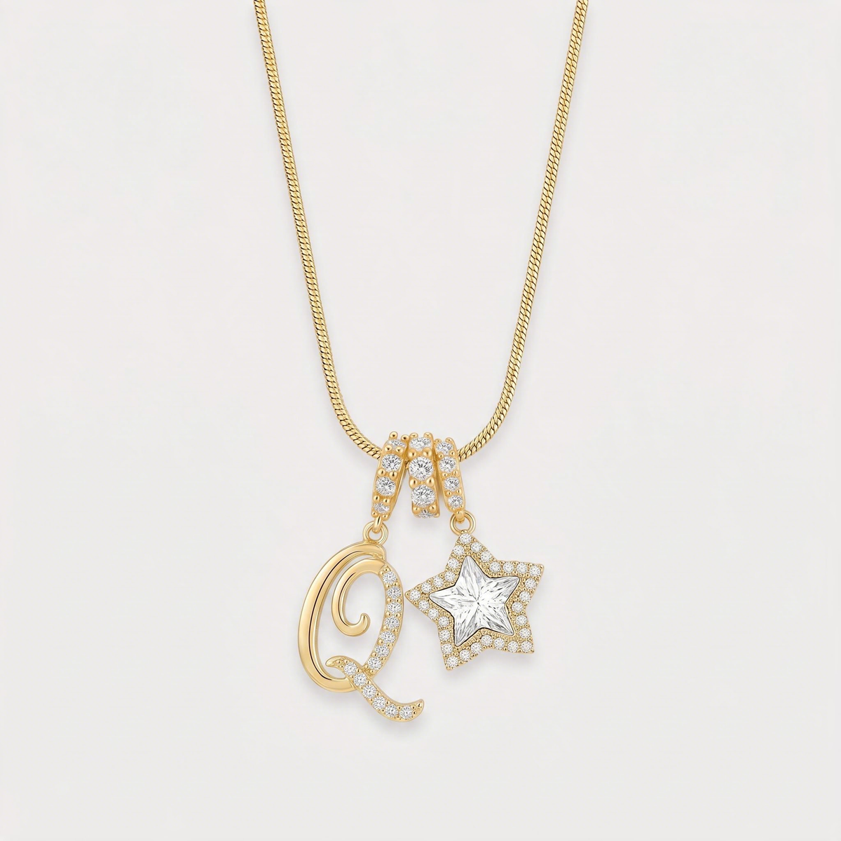 Letter Q · gold