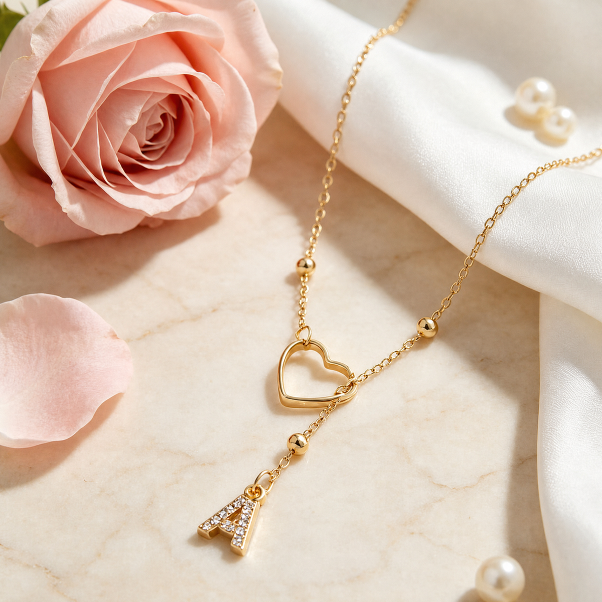 Gold drop initial necklace with open heart