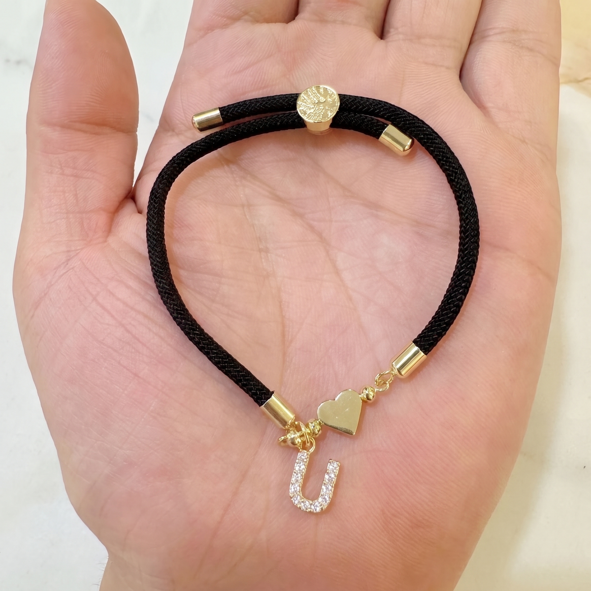 Black initial rope bracelet, letter U