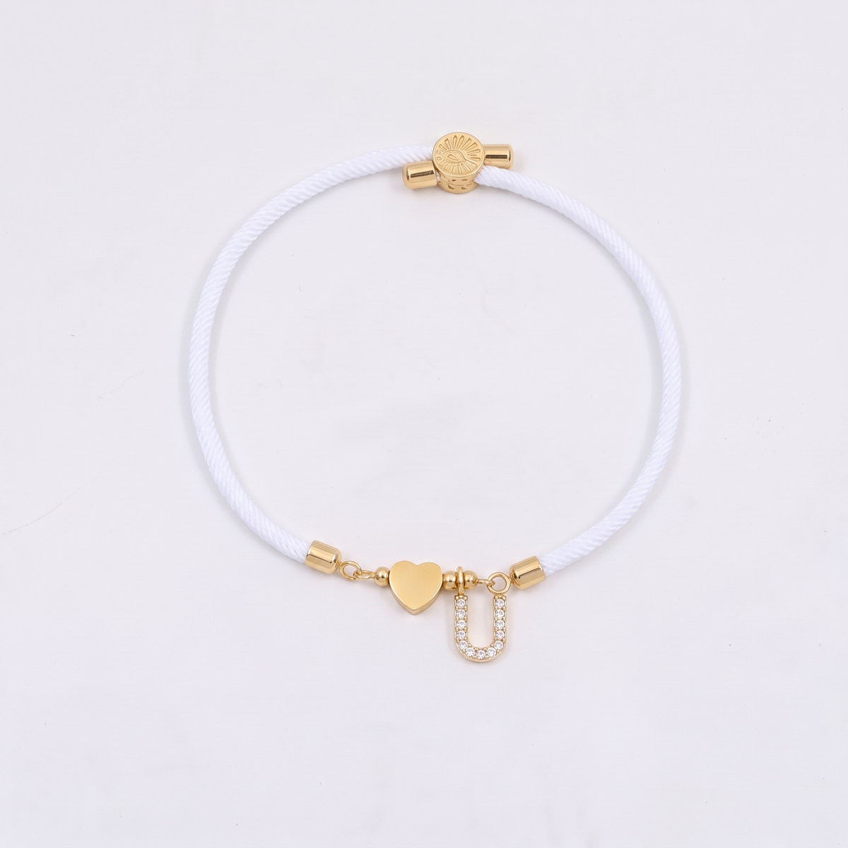 White initial rope bracelet, letter U