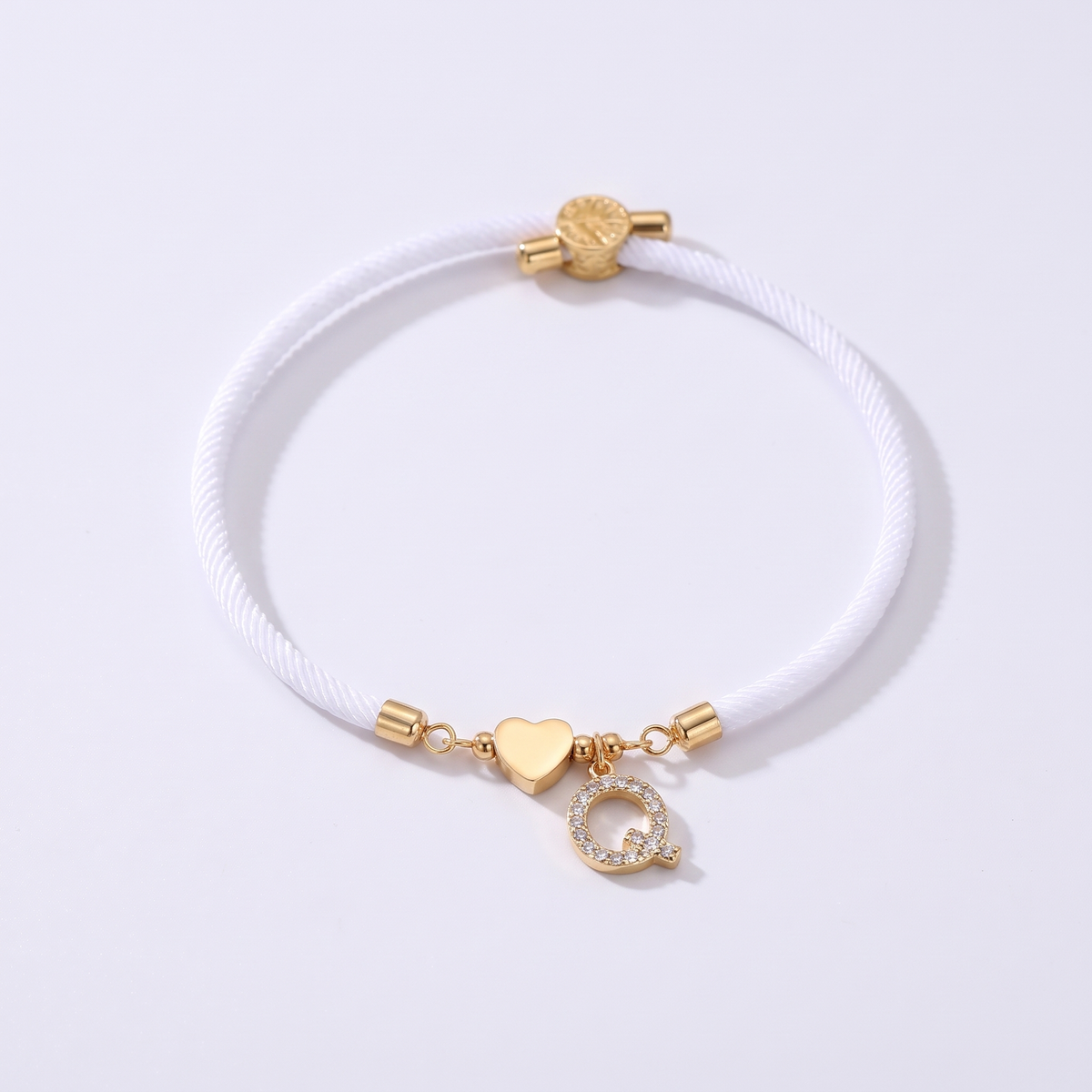 White initial rope bracelet, letter Q