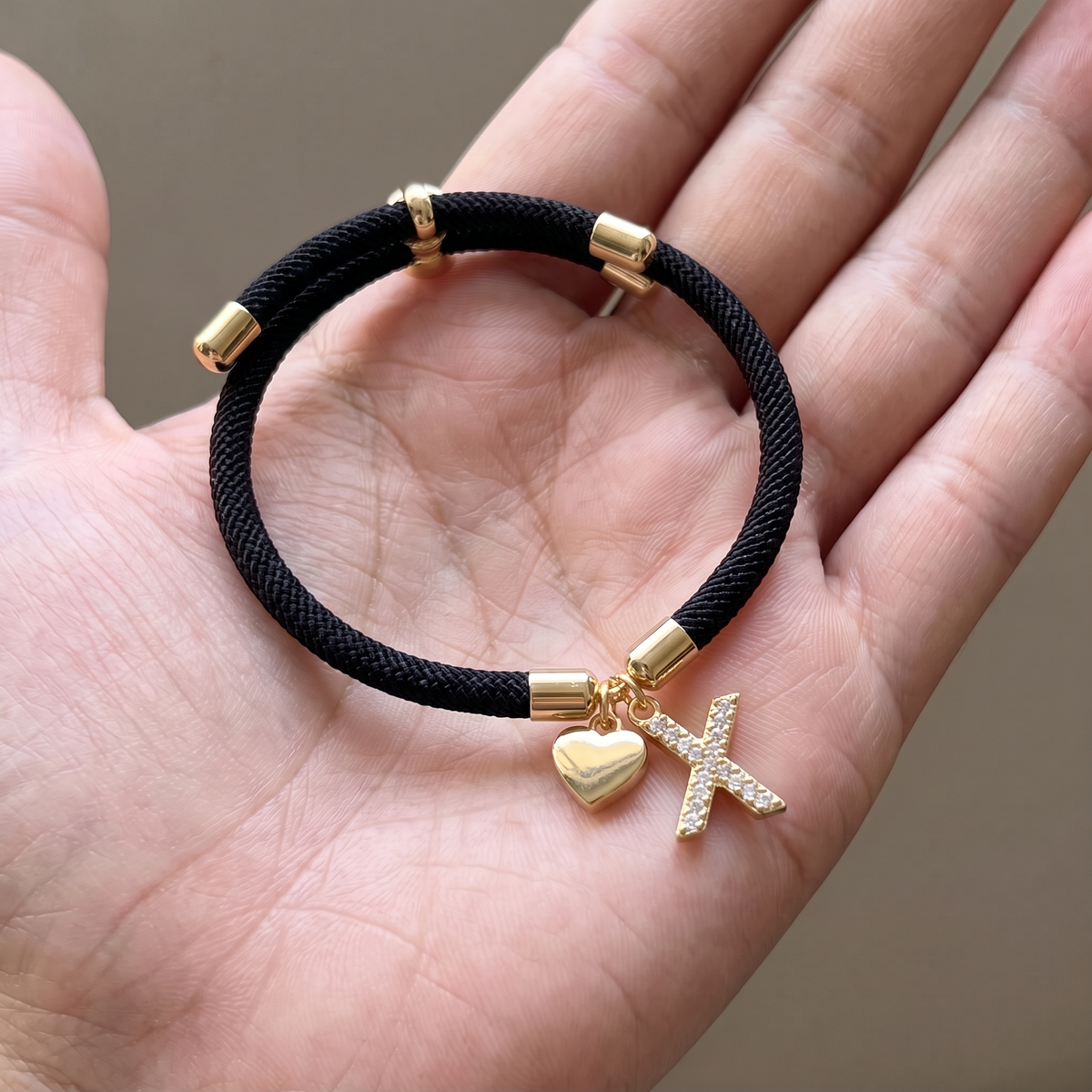 Black initial rope bracelet, letter X