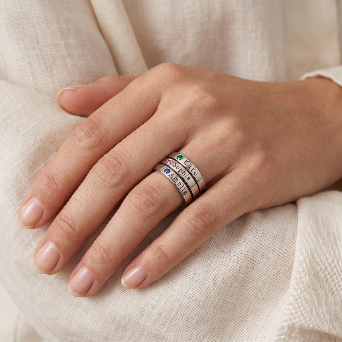 Silver loved ones birthstone rings worn