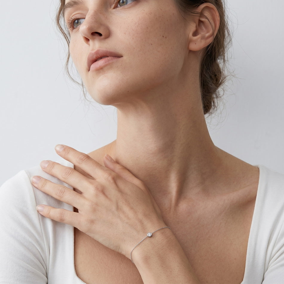 Model wearing the bezel solitaire bracelet