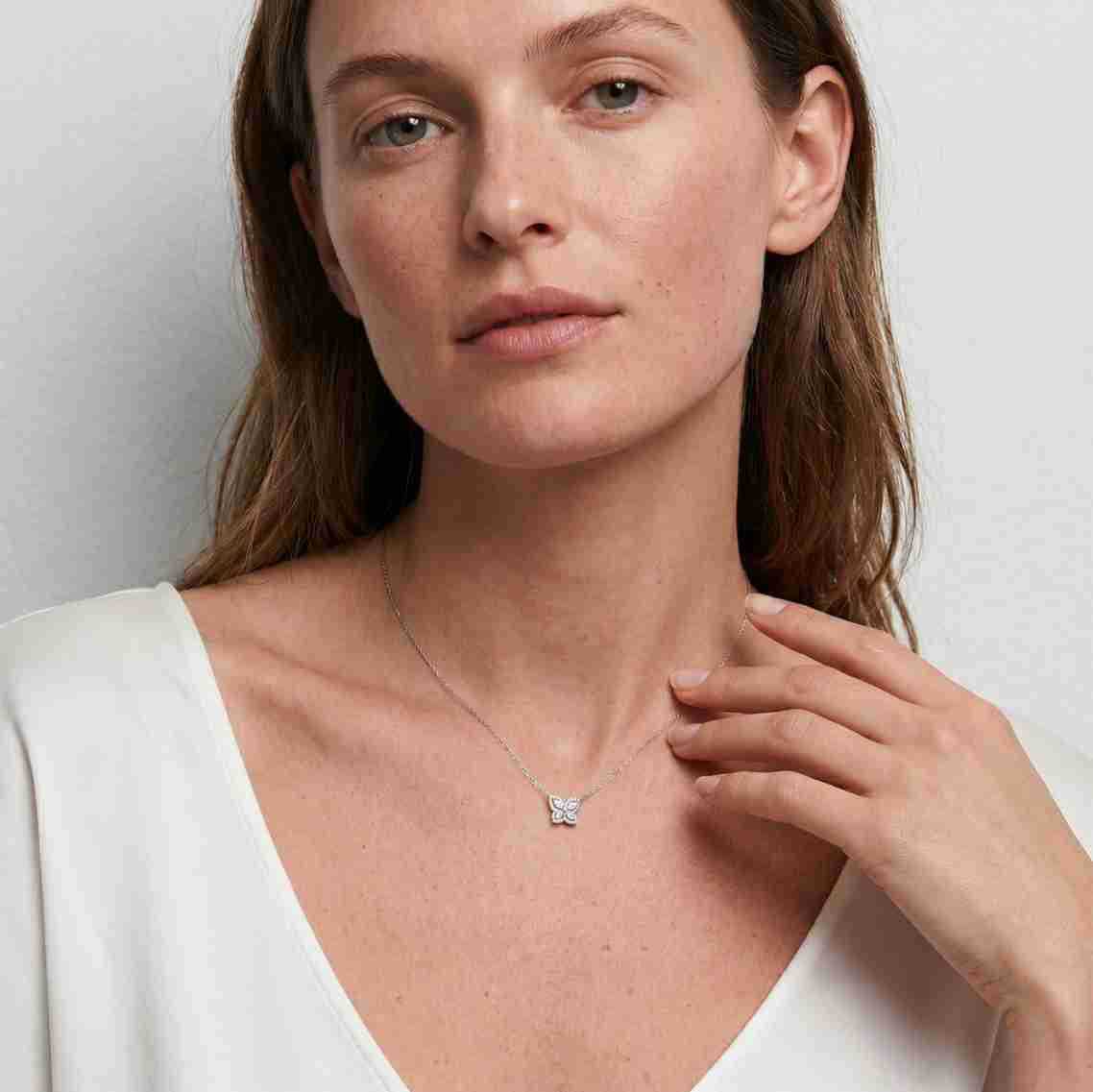 Model wearing the butterfly necklace