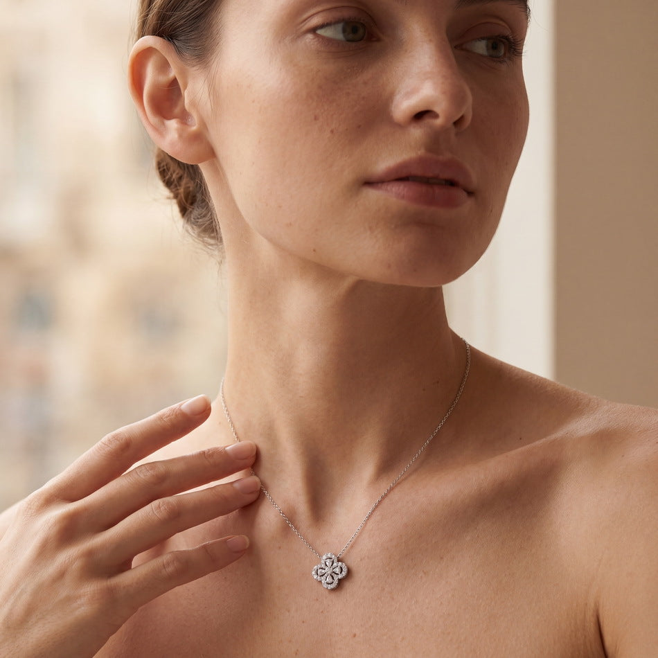 Model wearing the lab diamond clover necklace