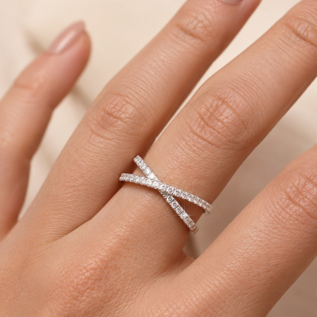 Crossover ring worn on the hand