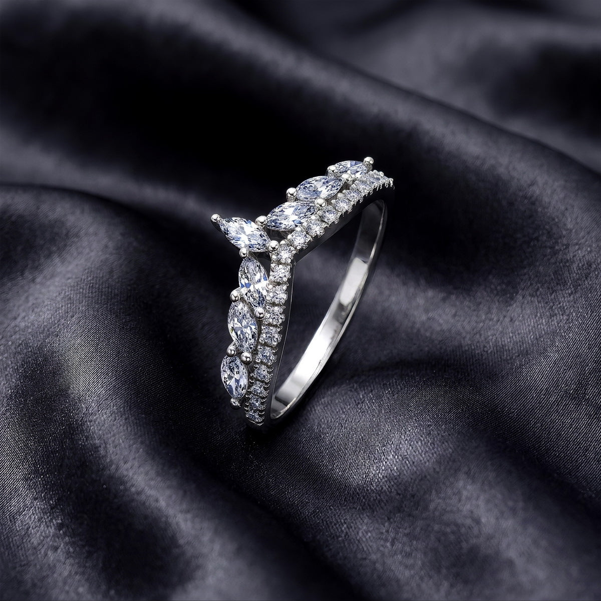 Crown ring on satin from the side