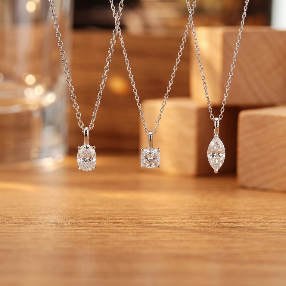Oval, cushion and marquise pendants side by side