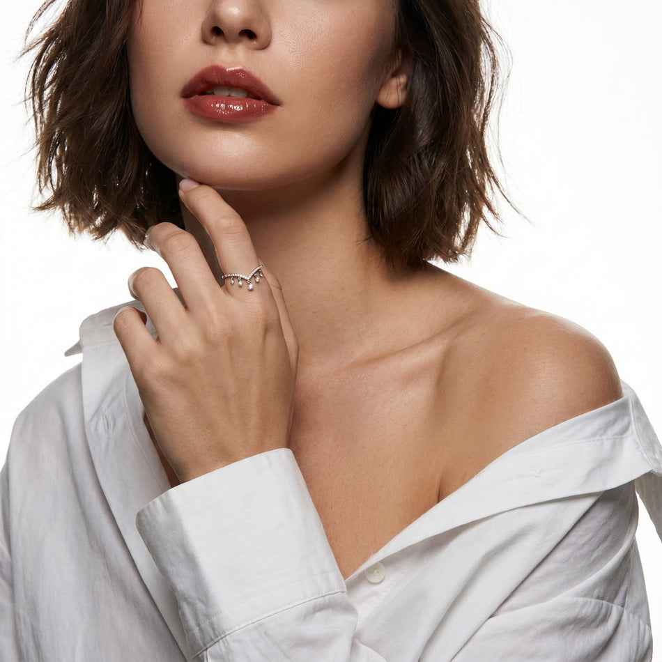Model wearing the dangle chevron ring