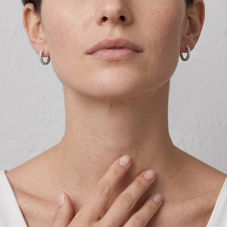 Model wearing the eternity hoops