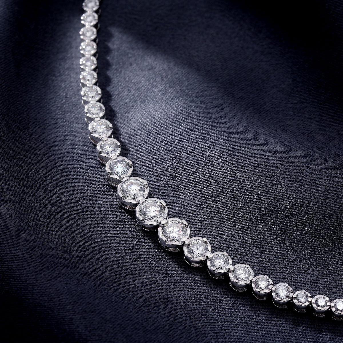 On dark satin, close up