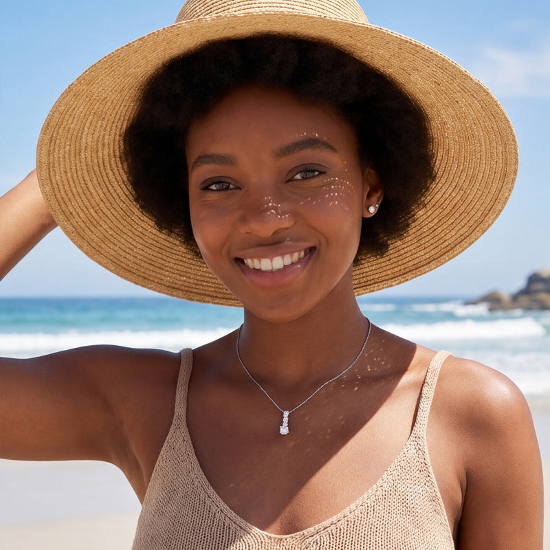 Model wearing the graduated drop pendant